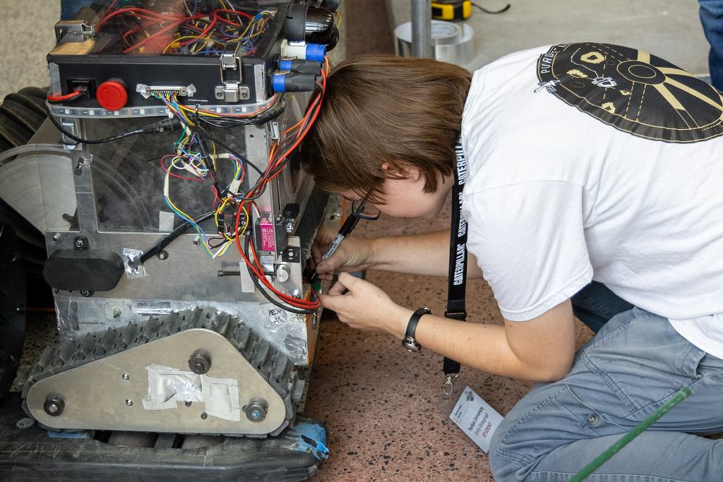 Team Members fixing the minibot