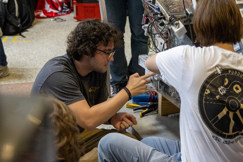 Team Members fixing our 2026 Robot